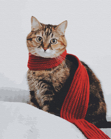 Kot w czerwonym szaliku na zimowym tle