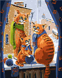 Rodzina kotów na oknie